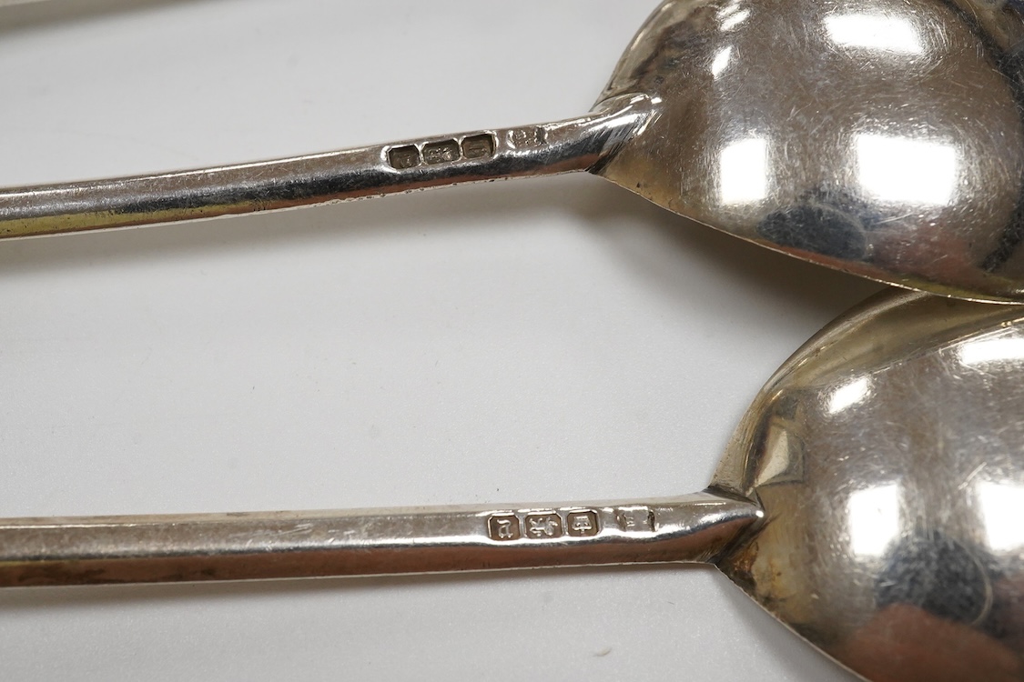 Eight assorted items of 19th century and later silver flatware including a Georgian silver fish slice(repair), various dates and makers, together with a Danish white metal spoon, a silver napkin ring and a small pierced